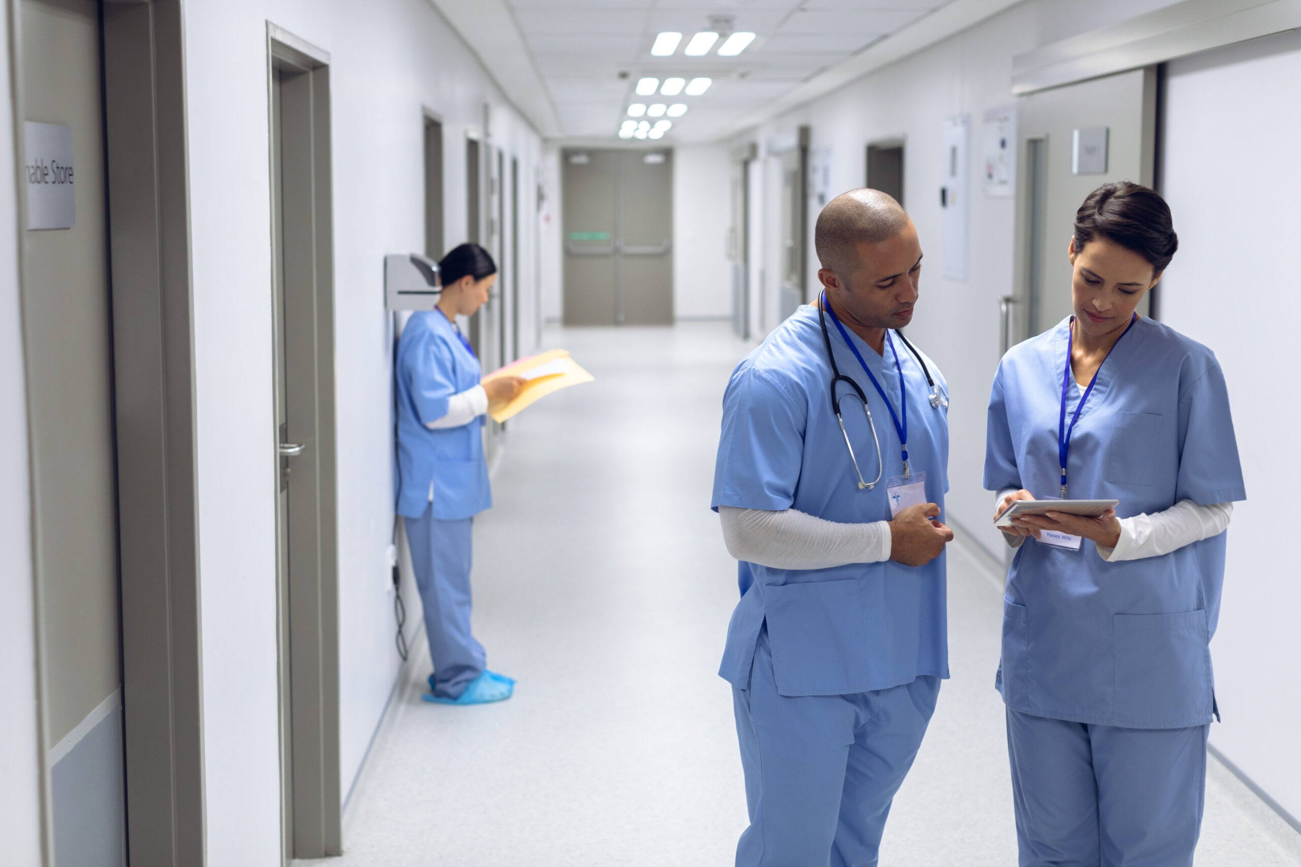 Nurse in hospital hallway representing workplace injury risk
